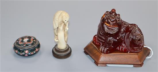 A Japanese ivory cane handle, a faux amber lion-dog and an enamel and ivory pill box
